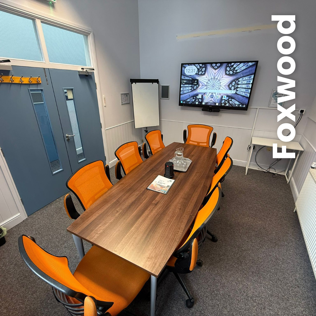 Foxwood room Foxwood Room - board room with bright orange conference chairs