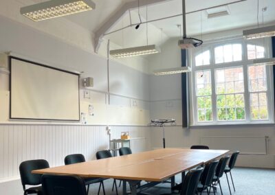 Denham Room set up in board room format -large table with 10 chairs placed around