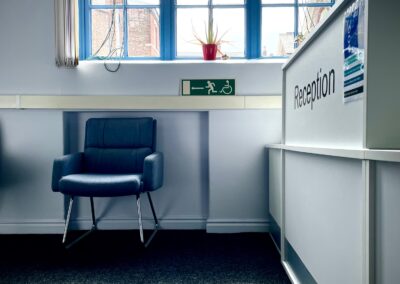 Reception desk and sign