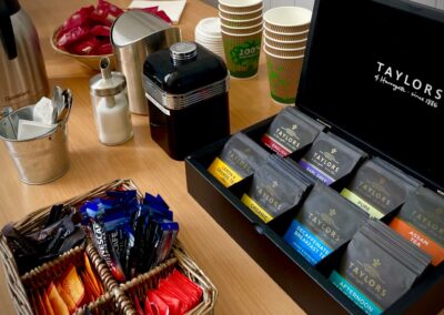 Taylors of Harrogate box of teas and a basket of instant coffee and sugars